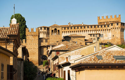 Low angle view of buildings against clear sky