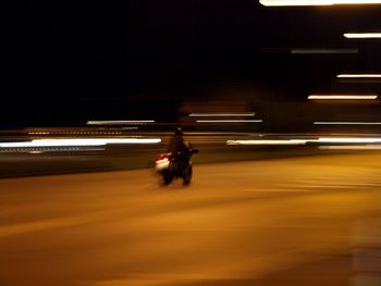 Blurred motion of people at night