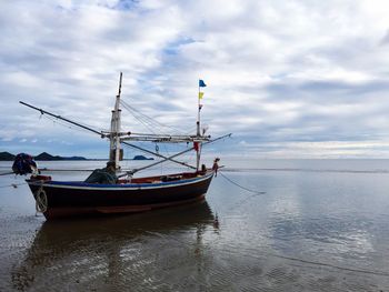 Boats moored in sea