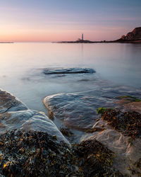 Scenic view of sea during sunset