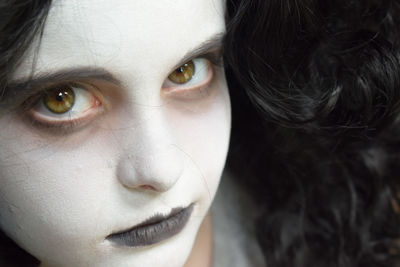 Close-up portrait of woman with halloween make-up