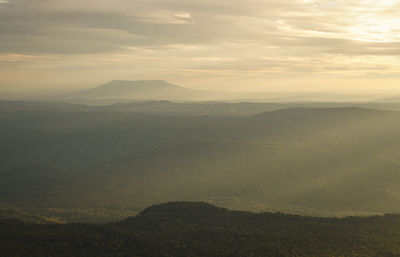 Scenic view of mountains against sky during sunset