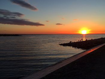 Scenic view of sunset over sea