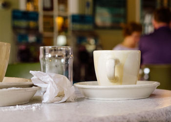 Close-up of drink in glass on table at restaurant