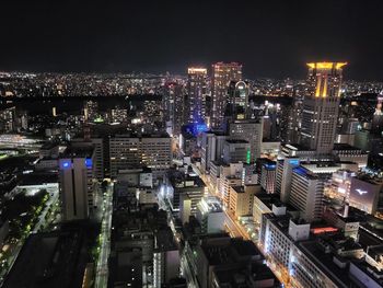 High angle view of illuminated cityscape at night