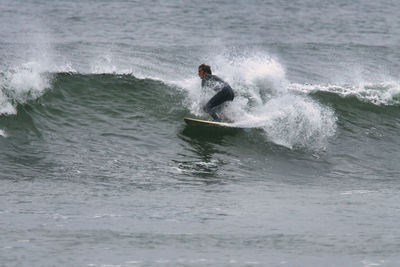 Man surfing in sea