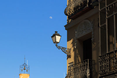 Low angle view of building against blue sky