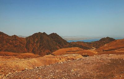 Scenic view of desert against clear sky