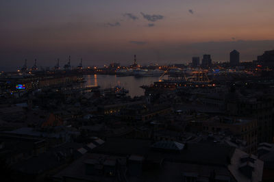 High angle view of buildings against sky at sunset