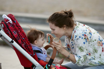 Mother and daughter outdoors