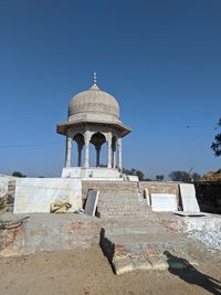 View of historical building against clear blue sky