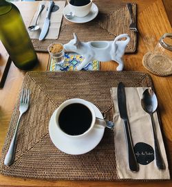 High angle view of coffee cups on table