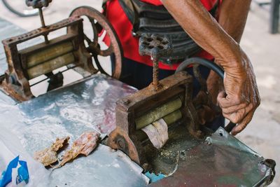 Man working on metal