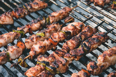 Close-up of meat on barbecue grill