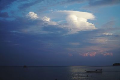 Scenic view of sea against dramatic sky