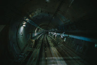 High angle view of railroad tracks in tunnel