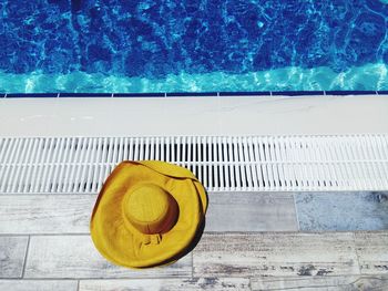 High angle view of yellow floating on swimming pool