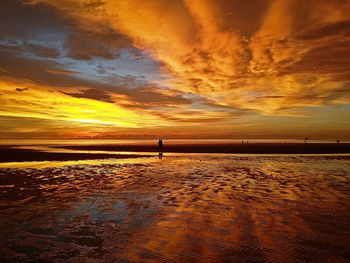 Scenic view of beach during sunset