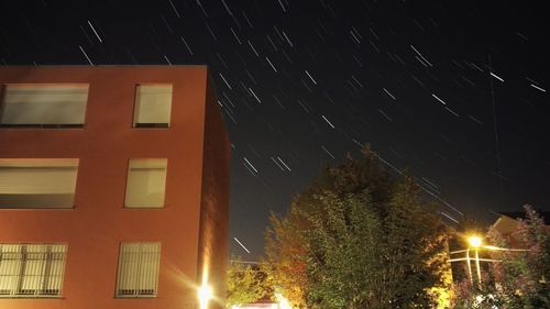 Low angle view of illuminated building at night