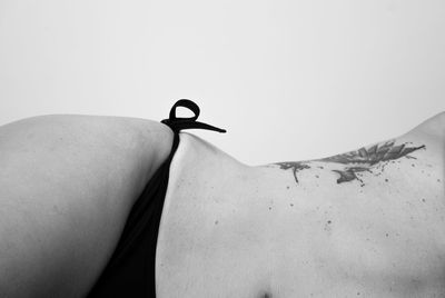 Close-up of hand over white background