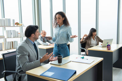 Business colleagues working at office