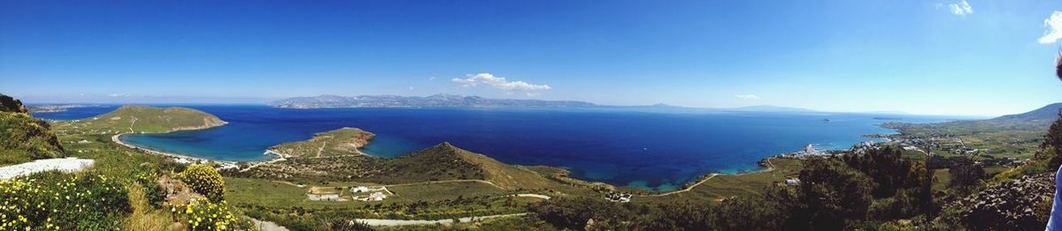 Scenic view of sea against blue sky