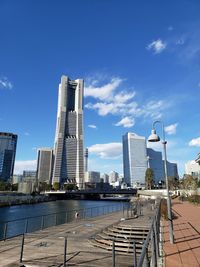 Modern buildings in city against sky