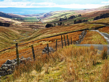 Scenic view of land against sky