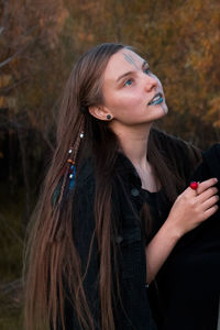 Close-up of young woman with face paint