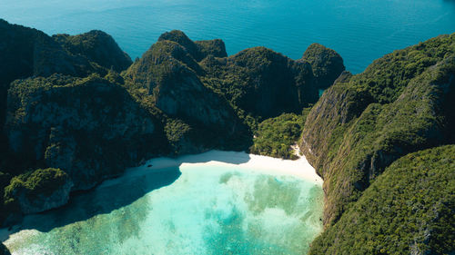 High angle view of rocks by sea