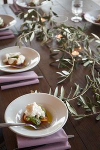 Close-up of savory food served in white plates