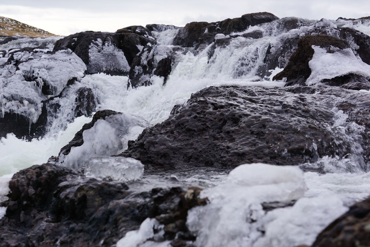 WATERFALL IN ROCKS