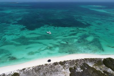 Drone view of beach with clear water in los roques, caribbean sea, venezuela