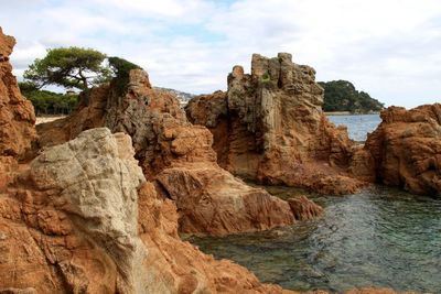 Scenic view of rock formations against sky