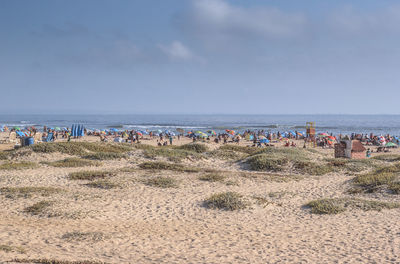 Scenic view of beach against sky