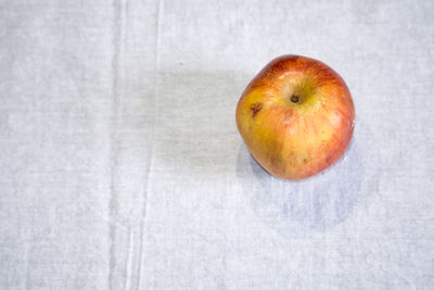 High angle view of apple on table