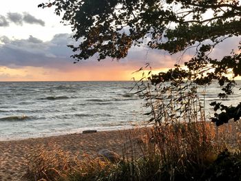 Scenic view of sea against sky during sunset