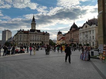 Tourists in front of building