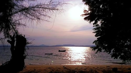 Scenic view of sea against sky at sunset