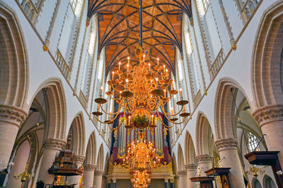 Low angle view of illuminated ceiling of building