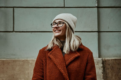 Woman walking at city street