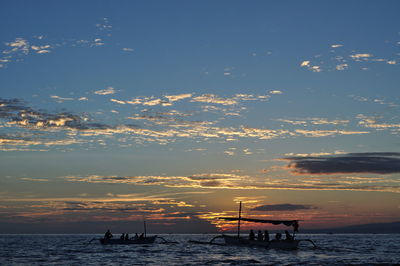 Scenic view of sea at sunset