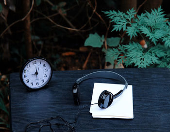 Close-up of clock on table