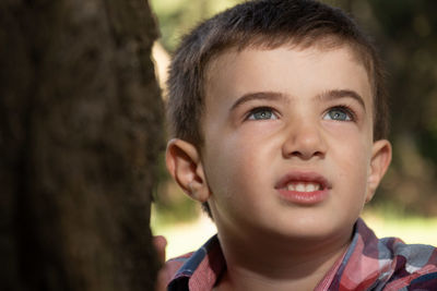 Close-up portrait of smiling boy