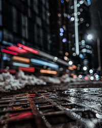 Close-up of railroad track at night