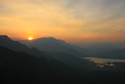 Scenic view of mountains at sunset