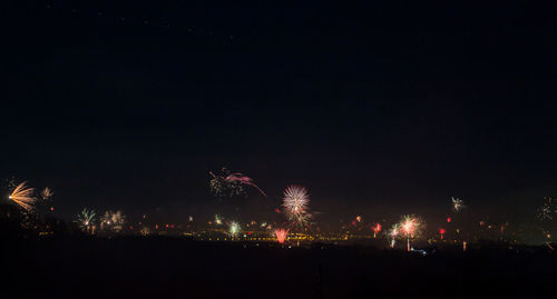 Firework display at night