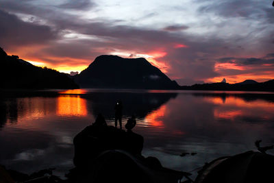 Scenic view of lake against sky during sunset