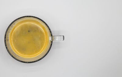 High angle view of drink against white background