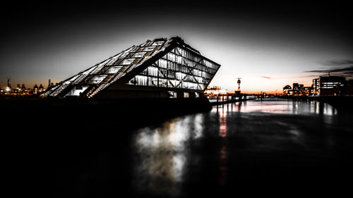 View of suspension bridge at night